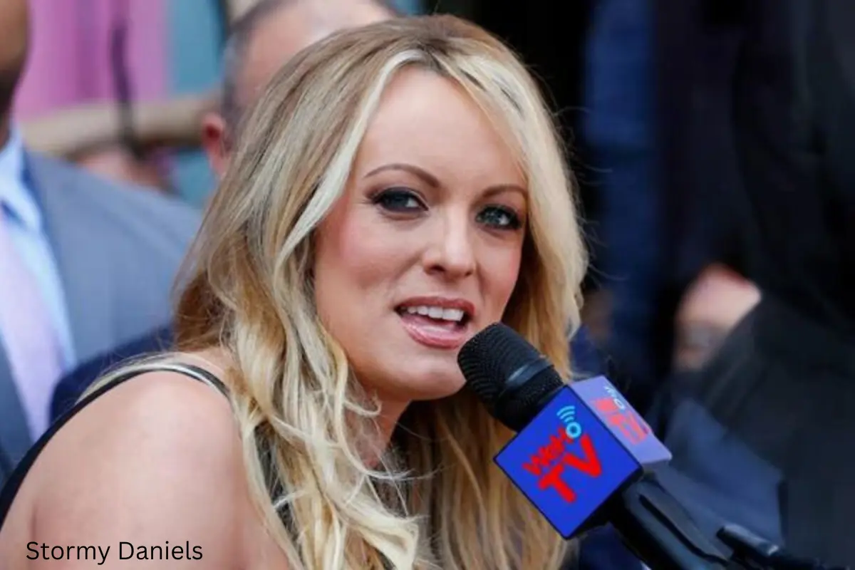 Stormy daniels speaking into a microphone