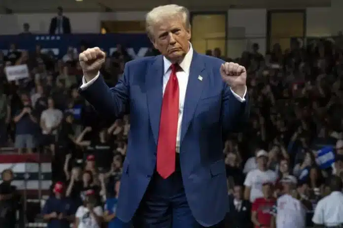 Donald Trump dances during a campaign rally at Findlay Toyota Center on October 13, 2024, in Prescott Valley, Arizona